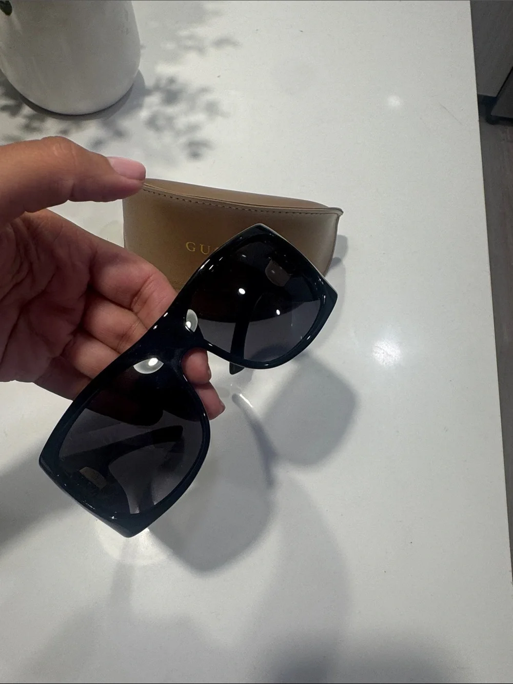 Gucci Black Shield Sunglasses with Gold GG Emblem